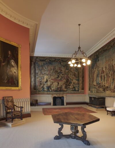 View of Kilkenny Castle's Tapestry Room with two Tapestries and a portrait of James Butler, 1st Duke of Ormonde by Sir Peter Lely on the walls.